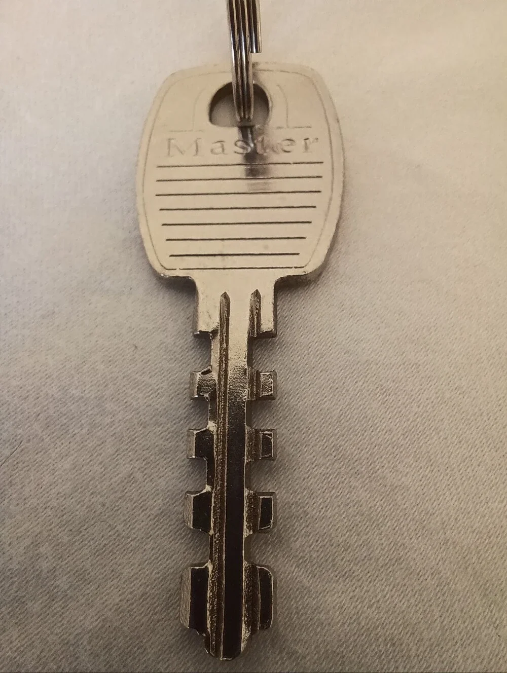 Master Lock Laminated Steel Warded Padlock with Key